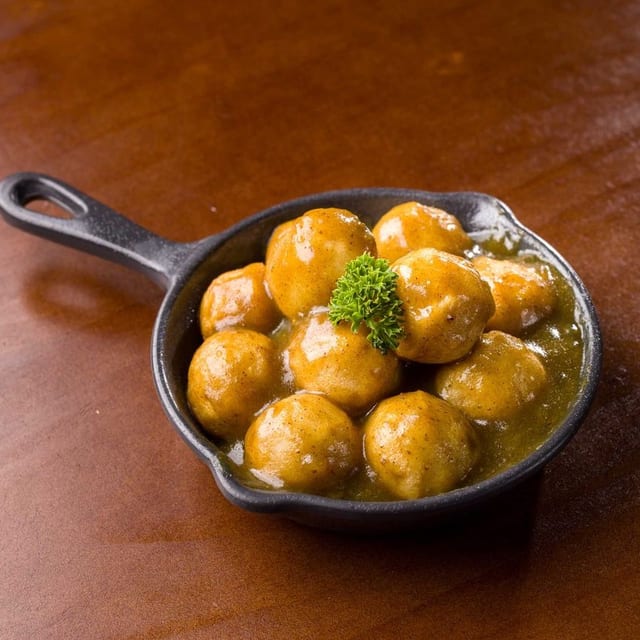 12 Pieces Curry Fish Ball with Rice.