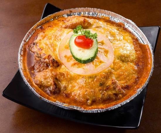 Baked Pork Chop with Cheese.
